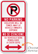 No Parking Violators Towed Sign with Bidirectional Arrow