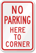 No Parking Here Corner Sign