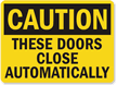 Caution Doors Close Automatically Sign