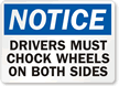Drivers Must Chock Wheels On Both Sides Sign