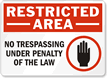 Restricted Area No Trespassing Under Penalty Sign