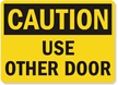 Caution Use Other Door Sign