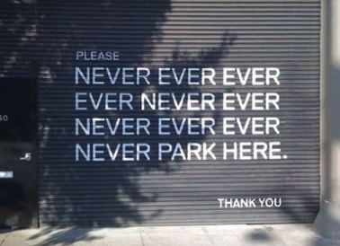 Never Ever Park here Parking sign