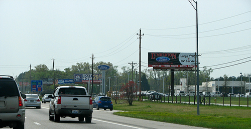 cars and billboards on NC highway
