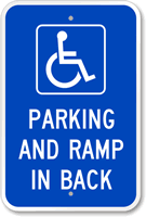 Parking And Ramp In Back With Graphic Sign