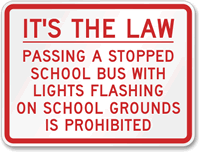 Passing Stopped Bus with lights prohibited Sign